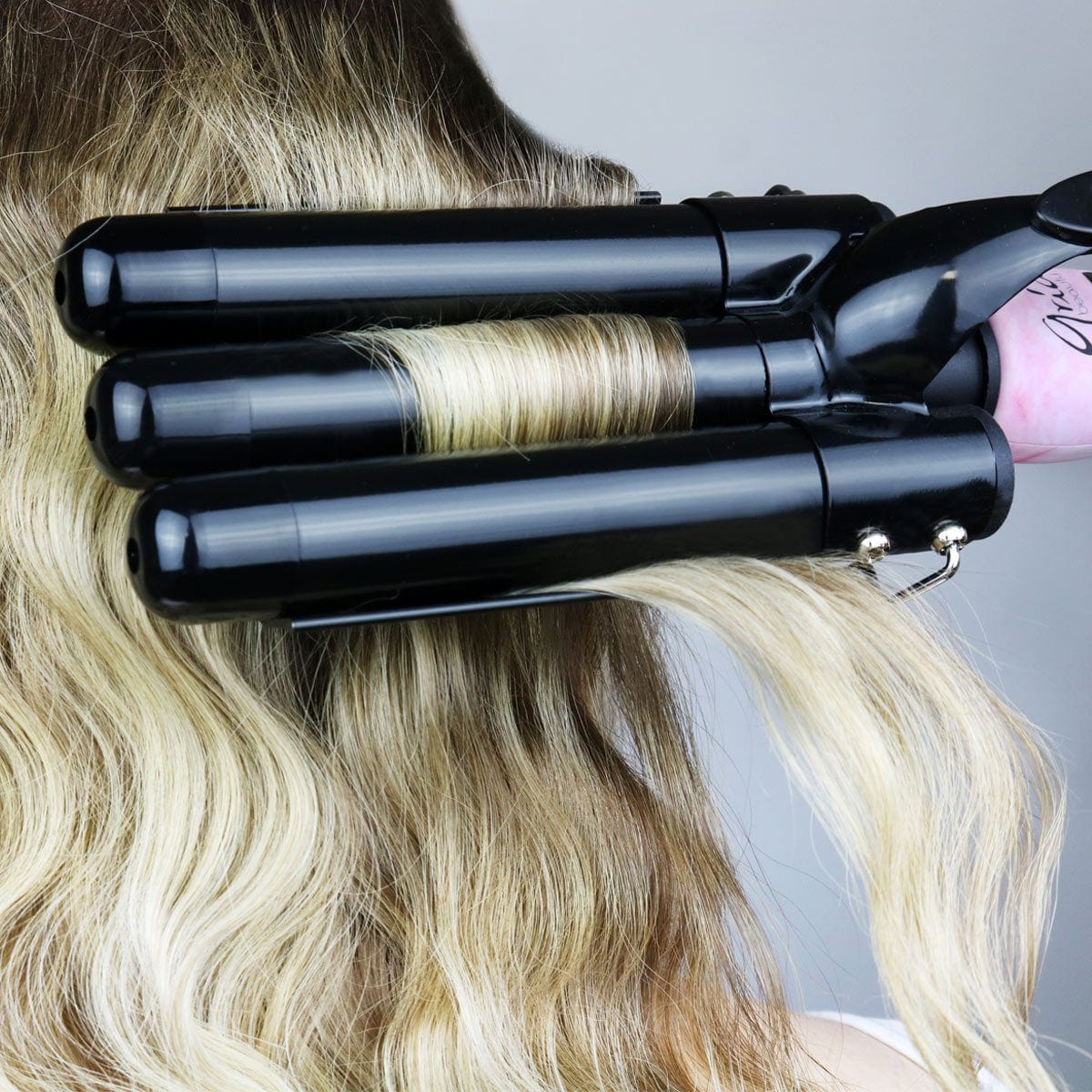 Triple wave curling outlet iron